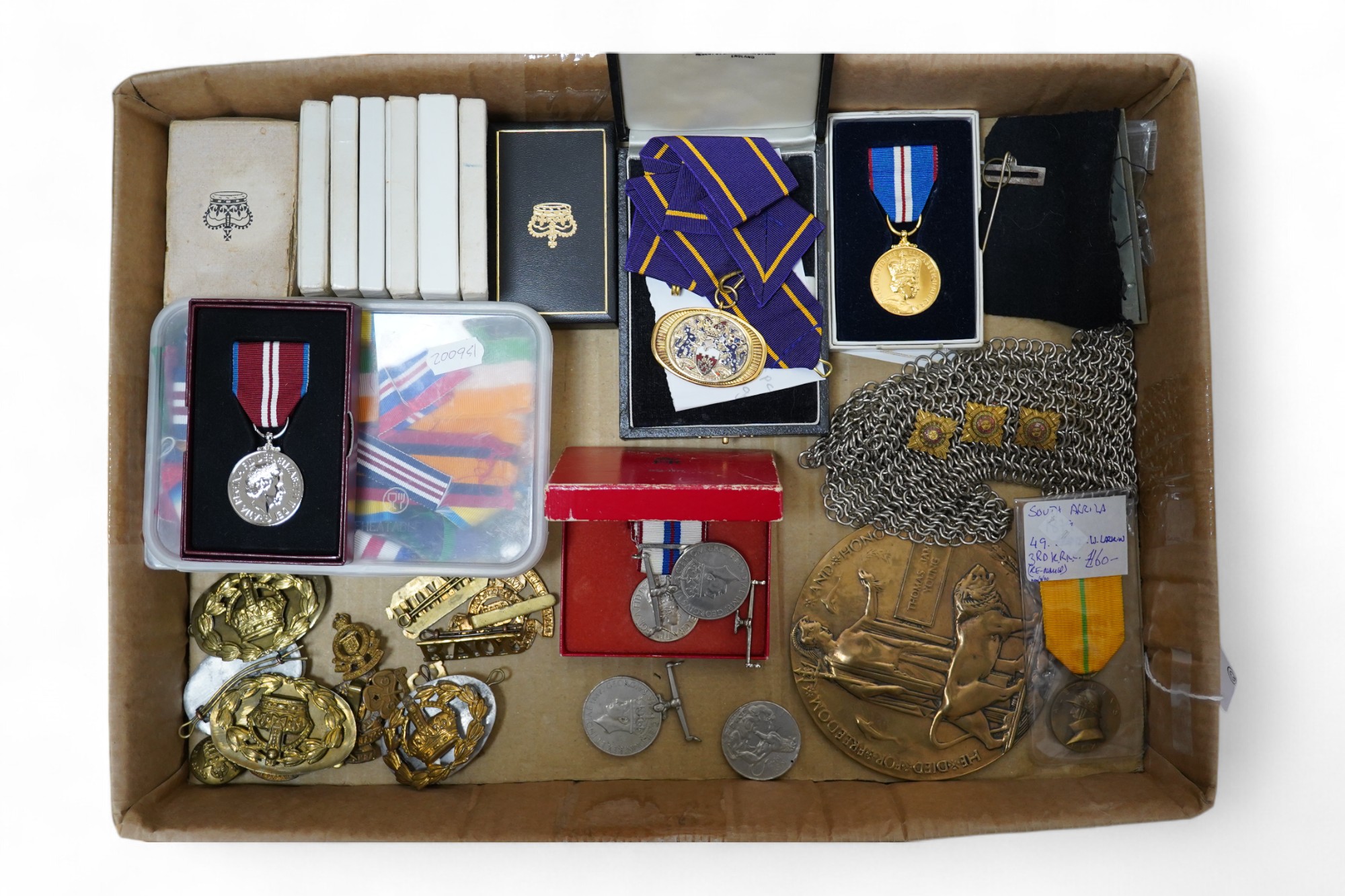 A collection of medal related items, etc., including